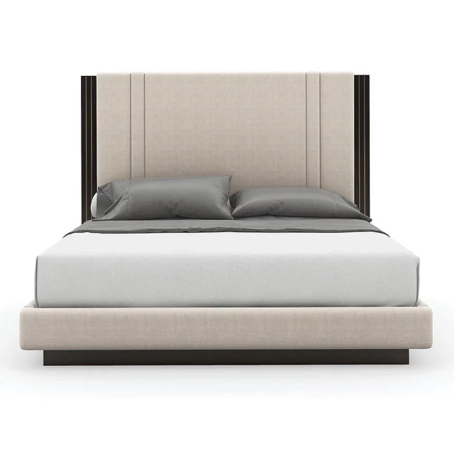 This bed features a dashing, modern aesthetic with a distinctive upholstered headboard, footboard, and side rails in a...