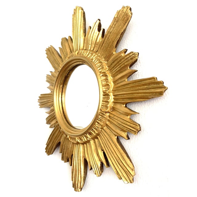 Sunburst Mirror in Gilded Wood, 1980s, in Very Good conditions. Designed 1980 to 1989