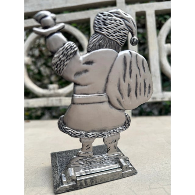 Antique style late 1970s solid pewter Santa Claus figurine stocking holder. No maker’s marks.