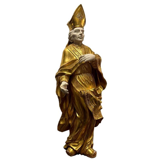 French carving depicting Saint Nicholas of Bari. It is handcrafted in carved wood and polychromed in gold leaf. France,...