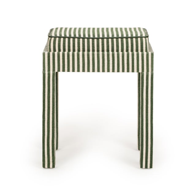 The Kora Stool is a warm, versatile accent with a striped fabric cover and a soft cushioned seat. Its durable wooden frame...