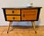 Adorable and very well made Googie-style German low console table with glass top, two drawers and a cabinet. Cute drawer...