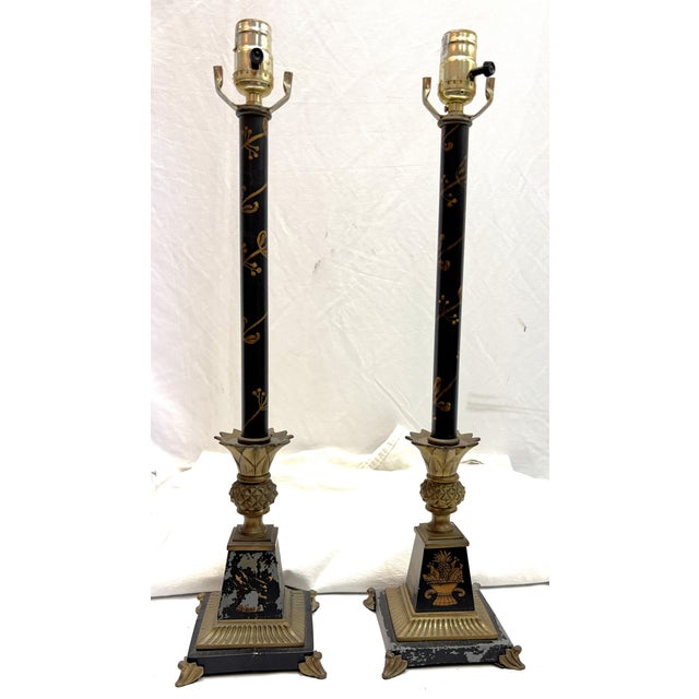 Great pair of vintage French style tole lamps from the late 20th century. Each is made of heavy metal and painted in...