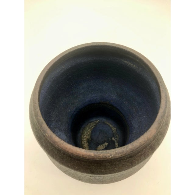 Fabulous large vase with a purple interior by Liisa Larsen ( Hallamaa ) for Arabia Finland. Mid 1960s I think.