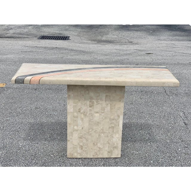 Very elegant Maitland Smith console/entry table. This piece is made of tessellated stone with a nice gray and pink curved...