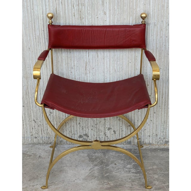 About Set of eight beautiful 1980s Italian chrome and red leather Savonarola director's armchair in perfect conditions,...