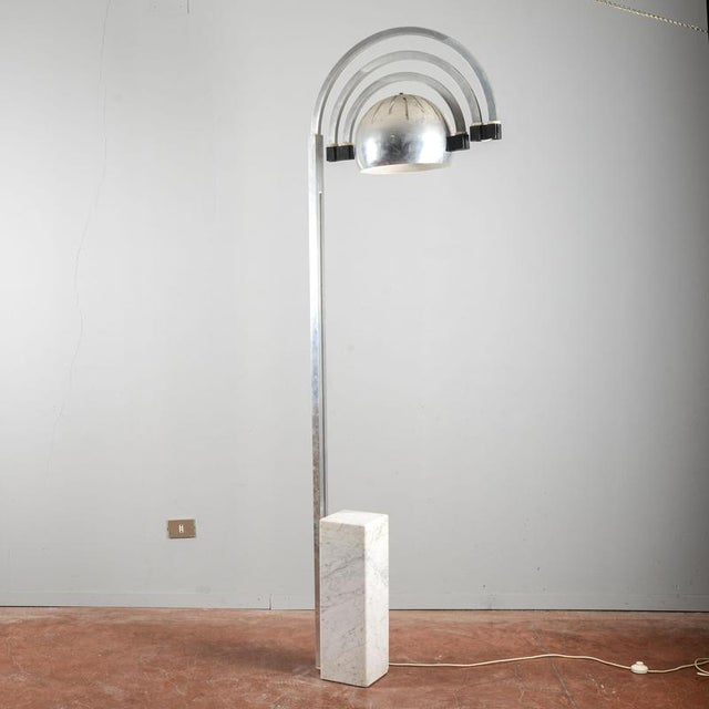 This spectacular arc floor lamp embodies the futuristic spirit of the space age style of the 1960s and 1970s, recalling...