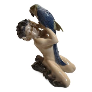 Vintage Royal Copenhagen Faun with Parrot Figurine #752 by Christian Thomsen For Sale