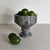 Handcrafted from richly veined grey marble, the Tasse Bowl is defined by its elevated pedestal form and strong geometric...
