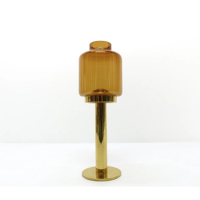 A rare set of three large Claudia L-102/32 candlesticks, designed by Hans-Agne Jakobsson for the Swedish manufacturer...