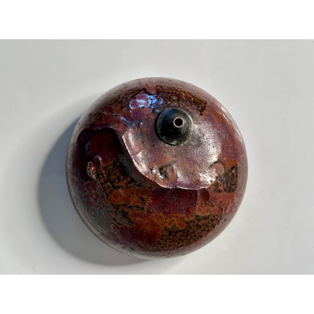 This sculptural oil lamp is an impressive high-quality piece of handcrafted ceramic art, created by the renown Danish...