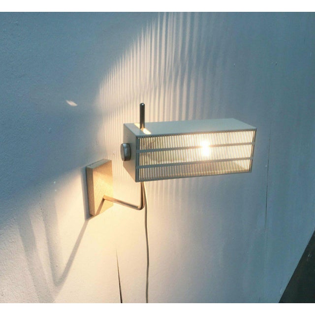 Mid century wall light from the german manufacturer bur leuchten. Here is a particularly rare version. cubic shapes...