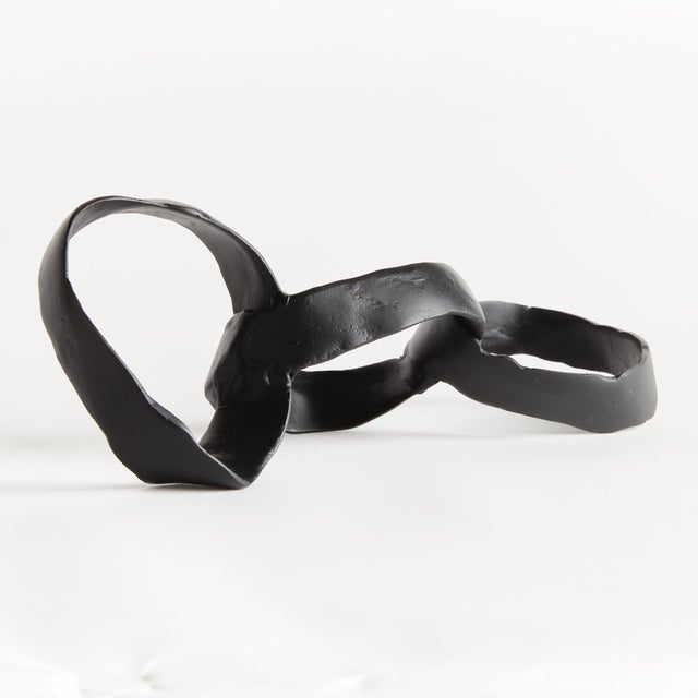 This cast aluminum objet is a modern take on the oversized chain link trend. Hand crafted using a centuries old sandcast...