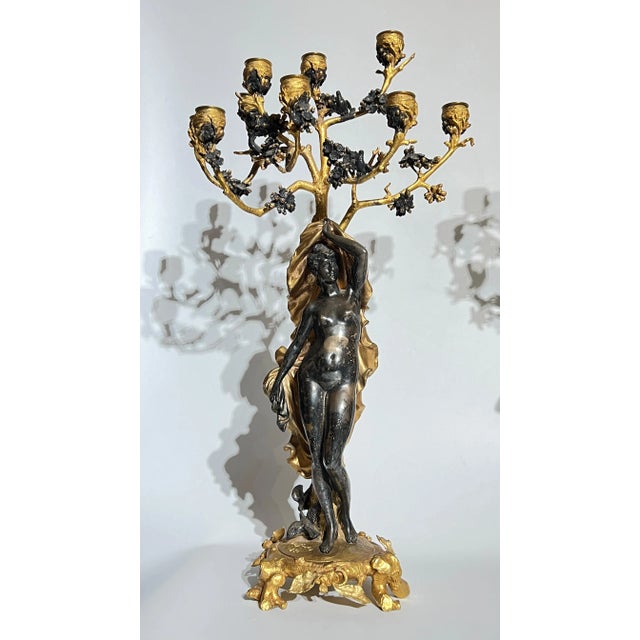 Pair of neoclassical figural candelabra in silvered and gilt bronze designed by the French author, essayist and artist,...