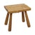 Rustic antique stool with a small hook beneath the seat—a vintage milking stool crafted from solid wood, originating from...