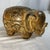 This vintage Paul Marshall mid-century ceramic elephant coin bank features a rich, speckled brown glaze and intricate...