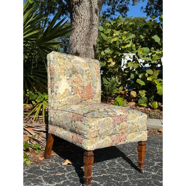 Beautiful vintage armless slipper chair upholstered in a charming all-over floral tapestry-style fabric featuring soft...
