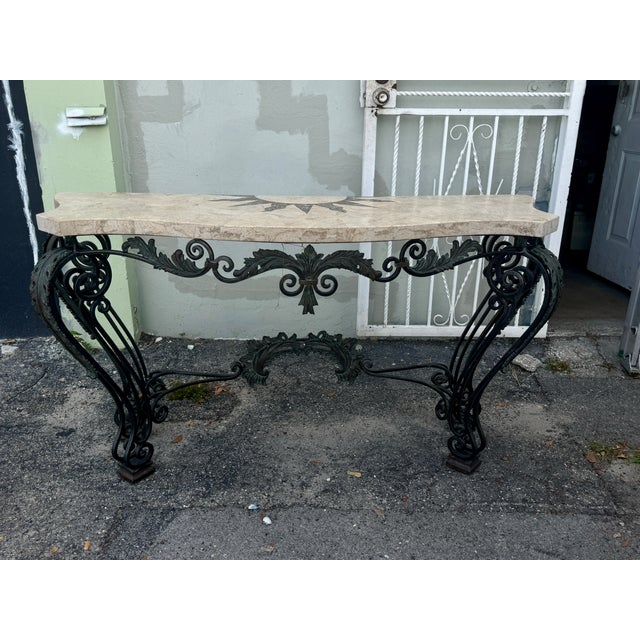 Maitland Smith Smith Wrought Iron Console W Composite Stone Top sold as found in good condition without damage showing...