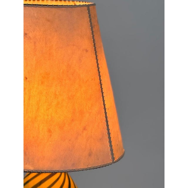 Capri spirale table lamp in brass & fabric by jonathan amar studio dimensions: ø 40 x h 50 cm materials: brass, molten...