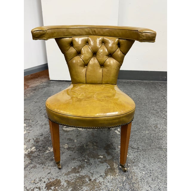 Design Plus Gallery presents a Mid-Century Cock Fighting Tufted Lounge Chair designed by Edward Wormley for Dunbar. This...