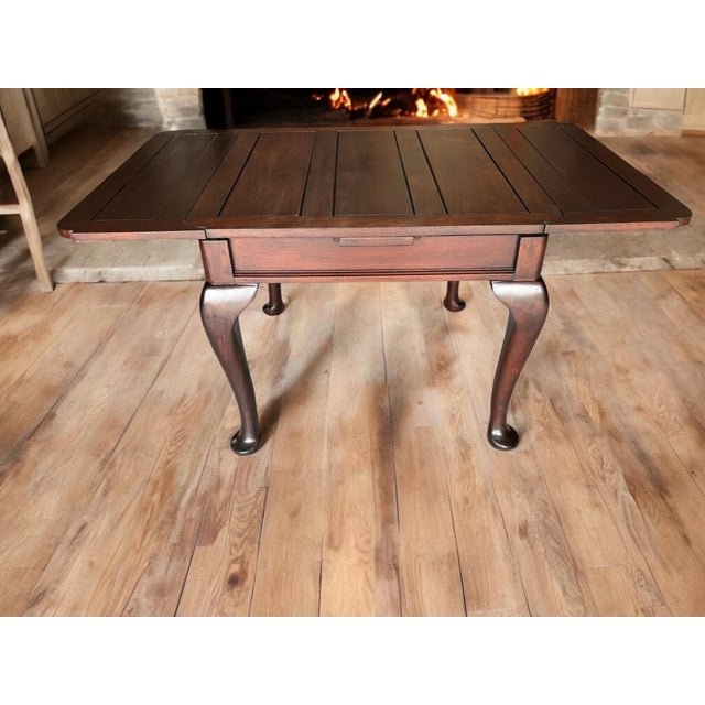 Great Solid Cherry Draw-lead Table. table top has great lines and will look great in any room. Table is super nice and...
