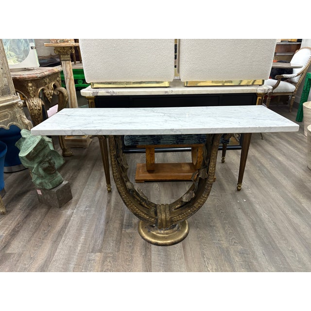 Italian Art Deco Bronze Console Table. Offered is a period Art Deco bronze u-shaped console table in a sculpted leaf...