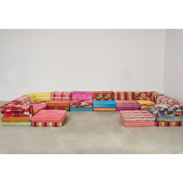 Monumental iconic 20th century Mah Jong sectional sofa designed by Hans Hopfer for Roche Bobois. The colorful and festive...