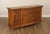 Stylized Carved Oak and Burlwood Nine Drawer Triple Dresser with Bun Feet