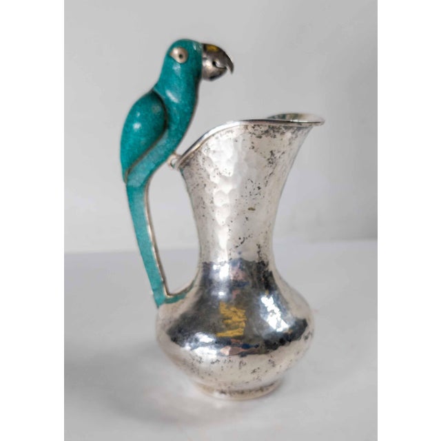 We are selling this great Mid-Century Modernist Mexican silverplate pitcher. The pitcher is after the famous designs of...