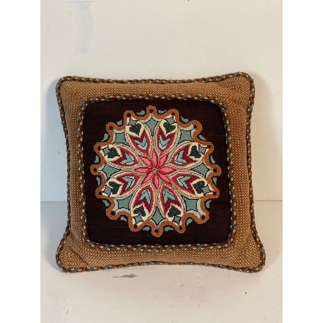 Beautiful handmade needlepoint central rosette on chocolate brown background, decorated with multicolored rope trim and...