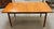 Item #PB122 Mid Century Modern Extending Teak Dining Table c.1960 Classic Mid 20th Century Design - Leaf Stores in Center...