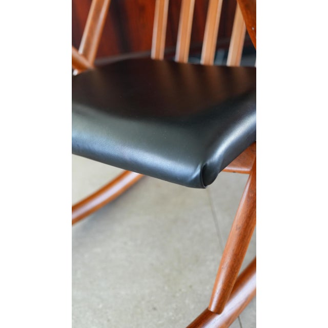 A beautifully sculpted Danish modern rocking chair by Benny Linden , showcasing the signature blend of organic form and...