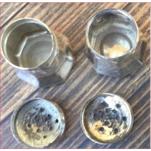 Vintage Cartier Boxed Set of 4 individual Sterling Salt and Pepper Shakers. Cartier is a highly recognized French luxury...