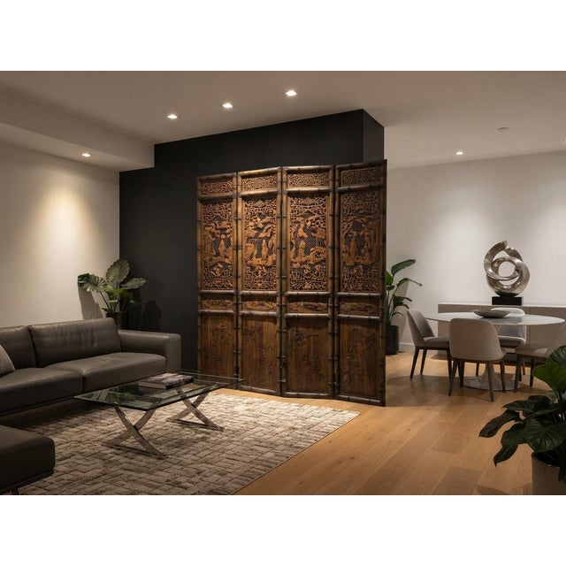 This exquisite four-panel room divider features intricate openwork wood carvings framed by simulated bamboo structural...