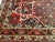 4′ 8″ x 8′ 7" Vintage Persian Bidjar (Bijar) gallery (corridor) rug in a medallion floral pattern was woven in the early...