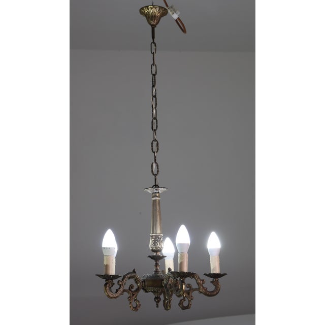 Fascinating brass chandelier. The chandelier has been fully restored. Height with chain 90 centimeters, height without 40...