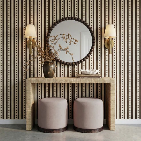 The Como Stool brings rich texture and grounded warmth to any space. A dark burl-finished base anchors the piece, while...