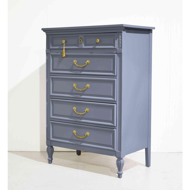 We have a gorgeous Mid Century French Louis Style Highboy Dresser by Dixie, newly painted to add a fresh, modern twist to...