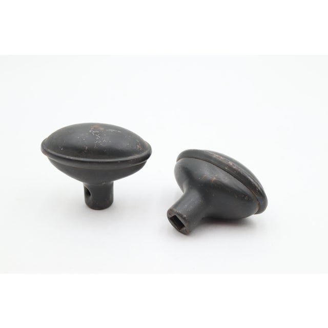 Vintage Classic style door knob set made with black finished oval knobs and rectangular back plates. The original mounting...