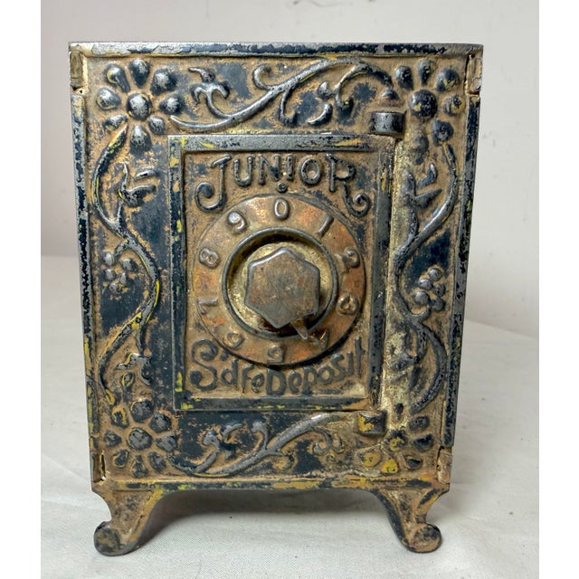 Up for sale is a wonderful antique 19th century cast Iron Junior Safe Deposit still bank. It is a unique and collectible...
