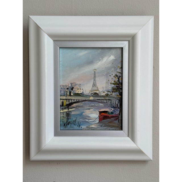 Offering a lovely late-20th century impressionist canvas oil painting of a Paris cityscape. This wonderful little work of...