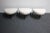 Mid-Century Modern Set of Three Midcentury Italian Modern Ebonized Footstools/Ottomans in Bouclé For Sale - Image 3 of 11