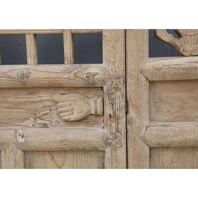 Vintage Chinese Carved Pine Door, with an open trellis design to the door top and sides and a carved hand latch. Because...