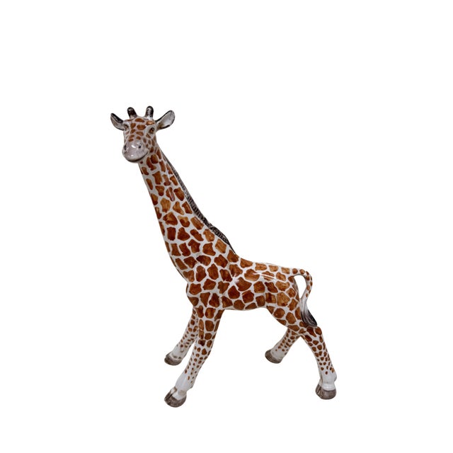 Midcentury hand-painted Italian pottery giraffe. Signed ‘9917 Italy’.