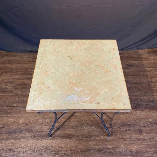 Early mosaic tile square shape iridescent table of off white or cream with an echo of pale blue. Versatile side table or...