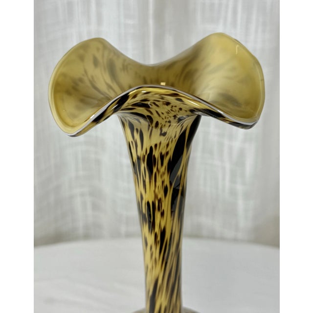 a touch of elegance to your home with this stunning Vintage Tortoise Hand-Blown Glass Vase, reminiscent of the iconic...