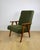 Vintage loft design armchair in green olive high boucle fabric. Loft design vintage armchair from the 1970s. Completely...