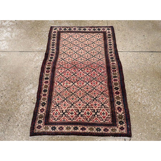 This early 20th century Caucasian Shirvan rug, measuring 2' 3" x 3' 5", features a finely executed allover lattice pattern...