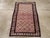 This early 20th century Caucasian Shirvan rug, measuring 2' 3" x 3' 5", features a finely executed allover lattice pattern...