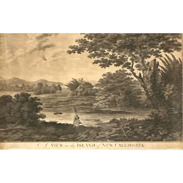 This vintage framed print titled “A View of the Island of New Caledonia” offers a serene glimpse into an idyllic tropical...